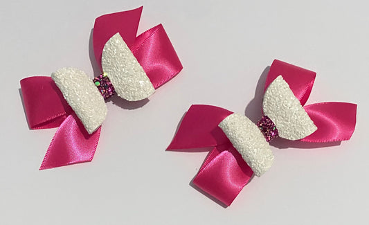 Pair of glitter and ribbon clips