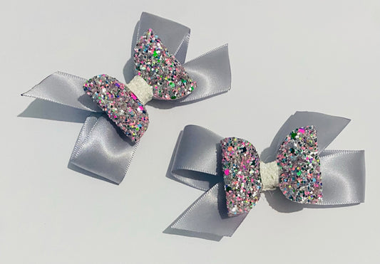 Pair of glitter and ribbon clips