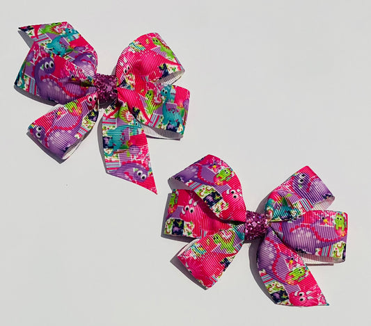 Dinosaur pinwheel hair bow